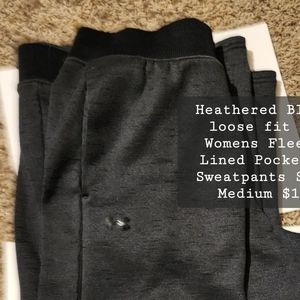 UA Womens Loose fit fleece lined pocketed sweat pants in heathered black